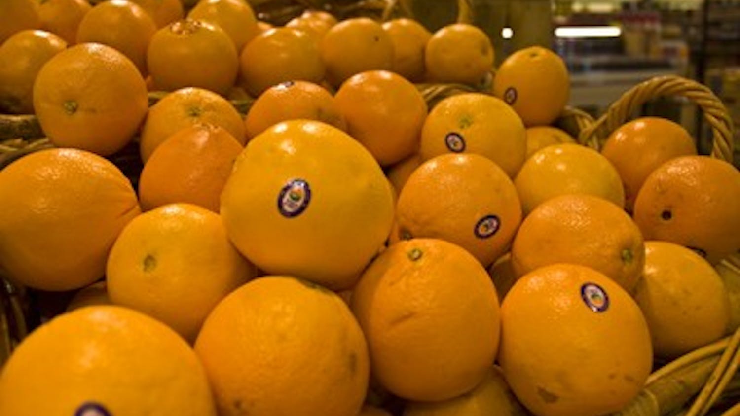 Baskets of Oranges sit on display at the Kroger Shopping Center on College Mall Rd. Oranges provide a source of vitamin C.