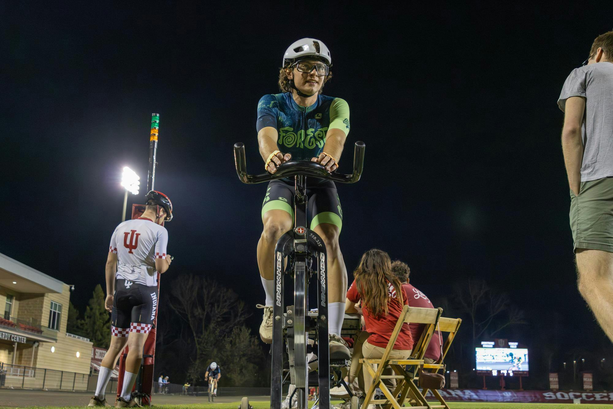 Forest cycler Romy Grimes warms up before he competes in the last race group of the night at individual time trials on Mar. 31, 2026 at Bill Armstrong Stadium in Bloomington. Forest cycling placed 12th at qualifers the weekend before. 