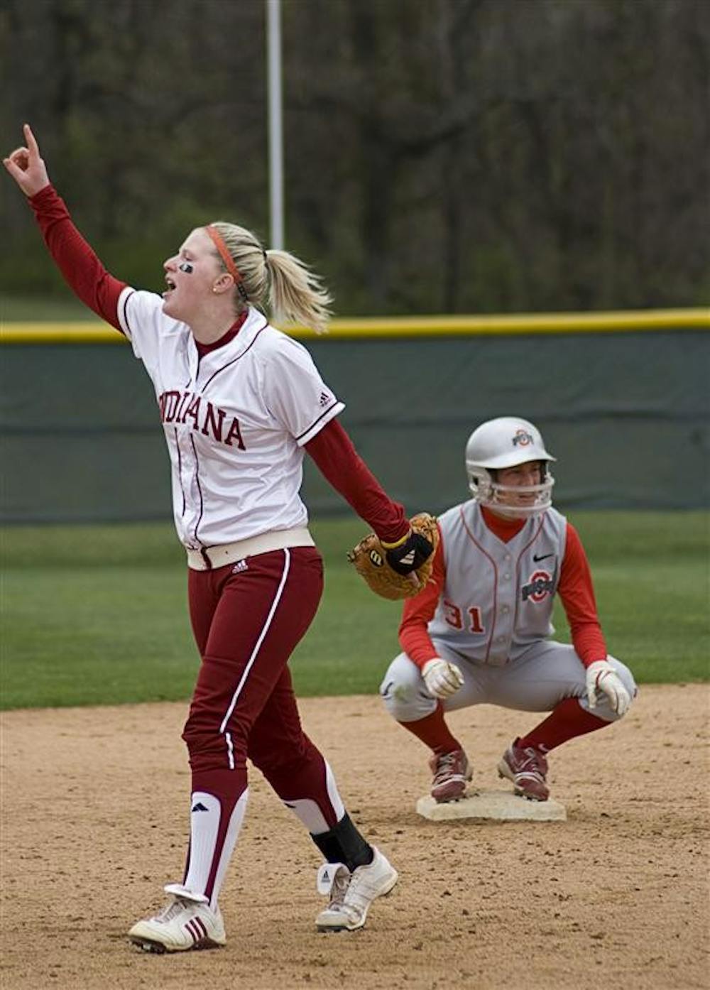Senior Emily Bergeson yells to her teammates during the first of two games against Ohio State on April 8 at the IU Softball Field. Sophomore Sara Olson pitched a no-hitter in the second game.