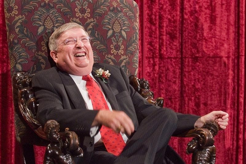 Dean of Students Dick McKaig laughs during his retirement ceremony Tuesday evening in Alumni Hall. McKaig is set to retire July 31 after 38 years of service to IU.
