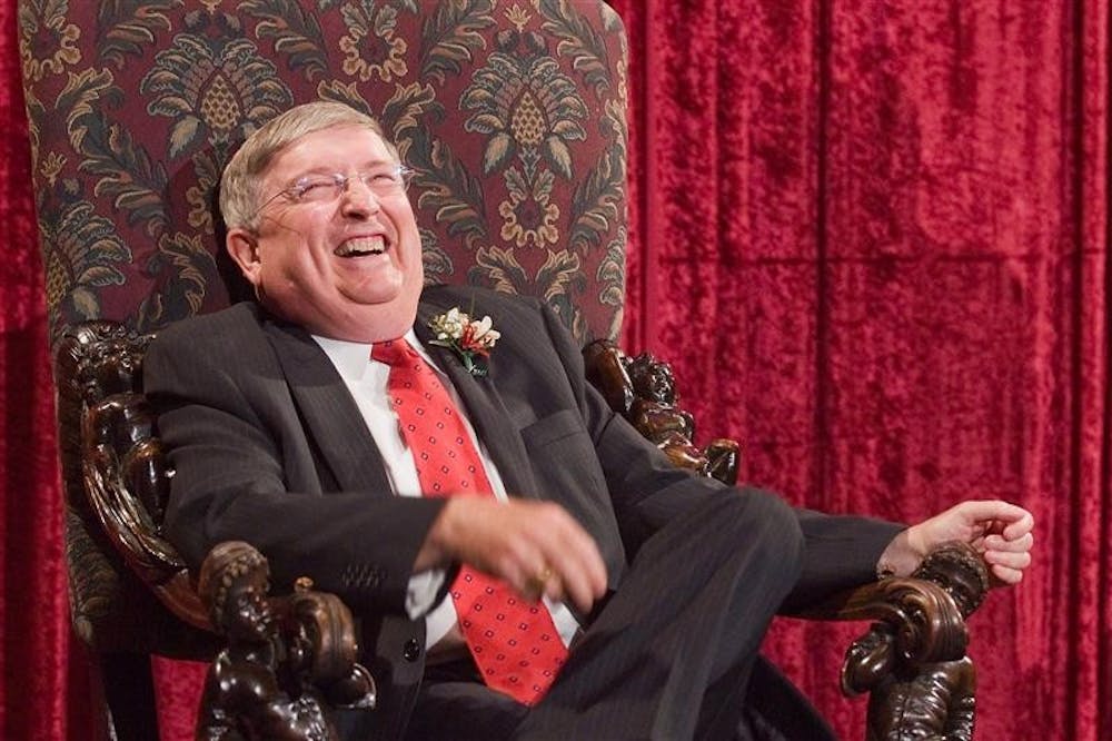 Dean of Students Dick McKaig laughs during his retirement ceremony Tuesday evening in Alumni Hall. McKaig is set to retire July 31 after 38 years of service to IU.