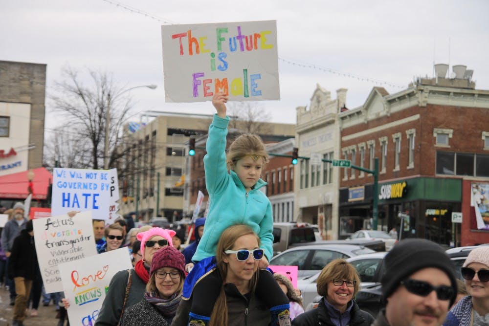 <p>Many members of the march were accompanied by children, helping to hold signs and advocate for women's rights. The Bloomington Resistance March took place Saturday, Jan. 20 at Courthouse Square in Bloomington and held speeches and a march attended by hundreds of Bloomington residents and IU students.&nbsp;</p>