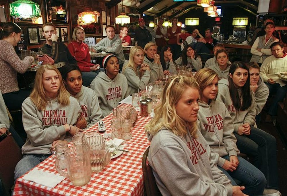 The IU Hoosier Volleyball team watches the tournament selection Sunday evening at Nick's English Hut. The Hoosiers were not selected this year.