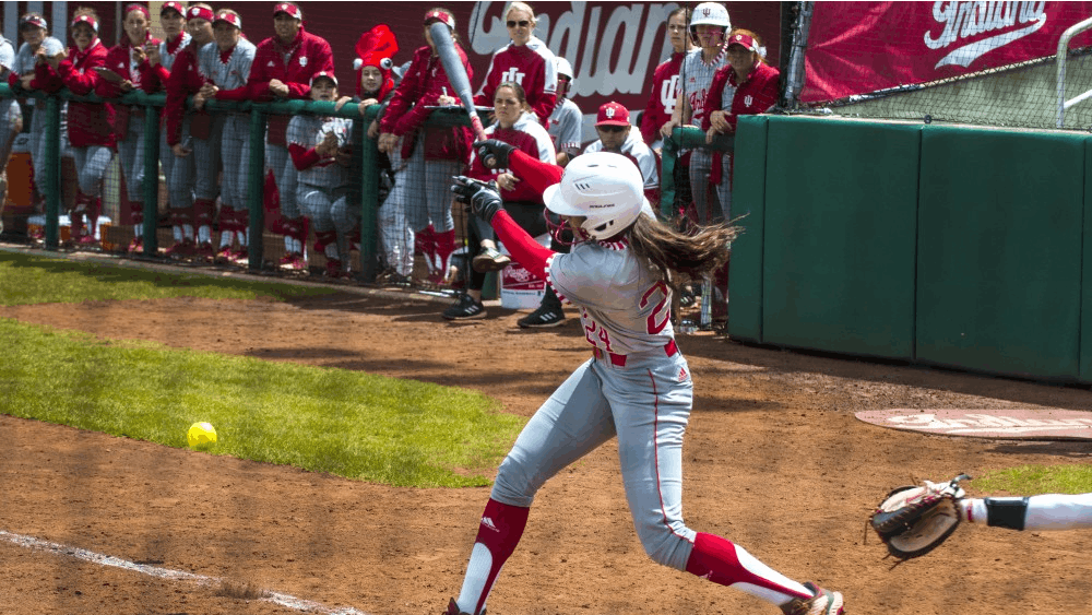 Sophomore Taylor Lambert swings at a pitch during a game against Rutgers on April 28 at Andy Mohr Field. IU lost the game, 5-2.
