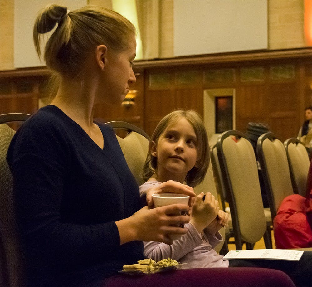 Alle Wilson( left) participles in WinterFest for learning Money saving strategy to balances her studies with rising her daughter Anya (right). WinerFest host by IU MoneySmarts and the Office of First Year Experience Programs.
