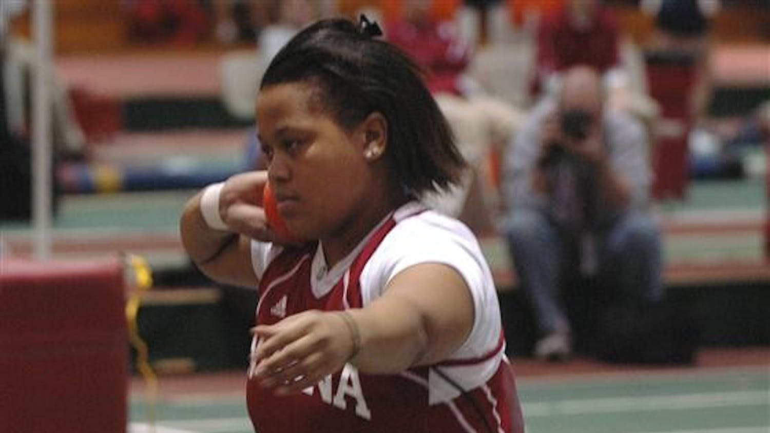 Senior Tiffany Howard prepares to throw a shotput on Saturday afternoon at the Harry Gladstein Fieldhouse. Howard scored ten points for her first place finish at the Big Ten Championships this weekend.