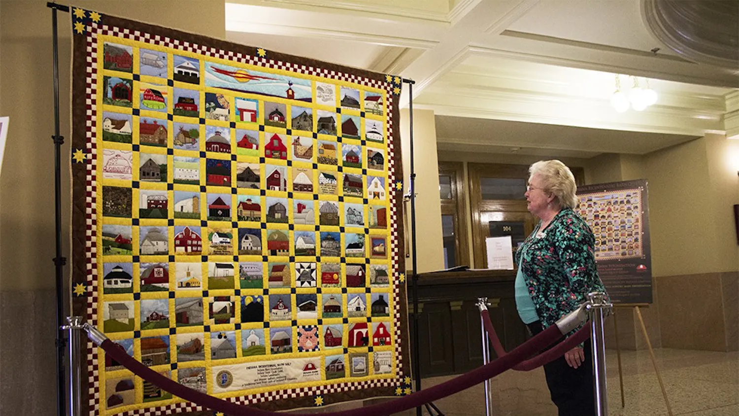 Cheryl Munson, who is involved with the County Council, looks at the Indiana Bicentennial Barn Quilt Monday at the Monroe County Courthouse. The quilt depicts Indiana's 92 counties and will be auctioned off to support barn preservation in 2017.