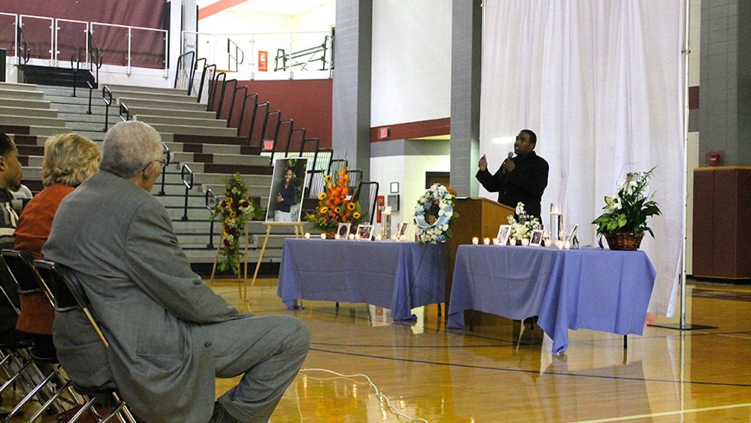 The Rev. Anthony Brown speaks at a memorial service for IU student Joseph Smedley on Saturday at Lawrence Central High School. Smedley's body was found Oct. 2 in Griffy Lake after the student was reported missing Sept. 28.