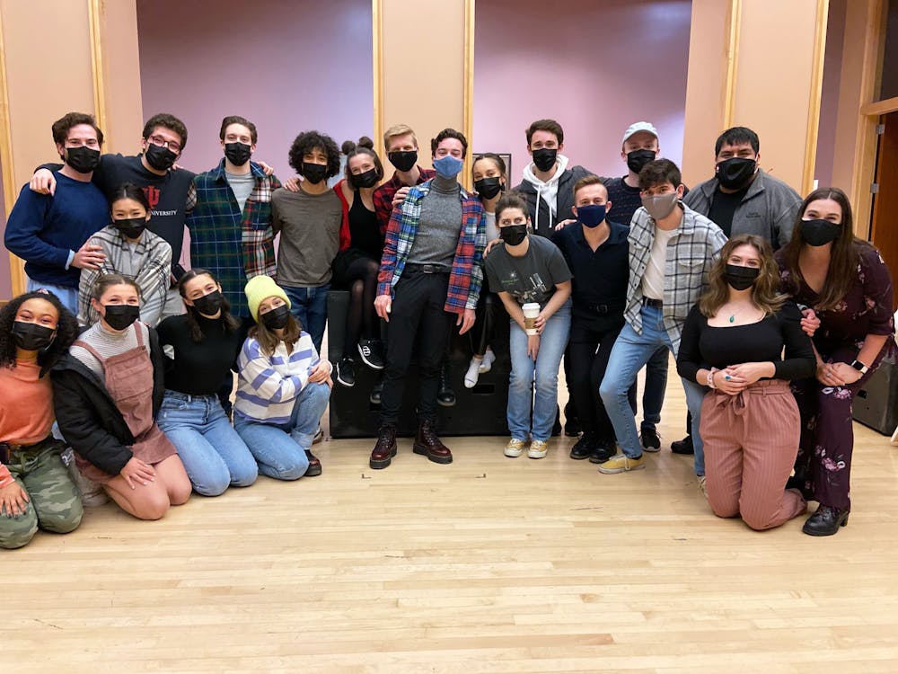 <p>The &quot;Into the Woods&quot; cast and team pose for a picture before their closing night performance Saturday. There were three performances of the show with each audience limited to 18 people.</p>