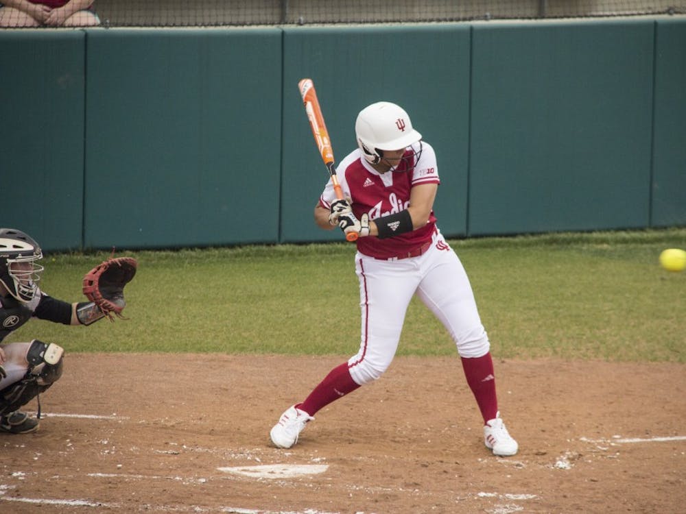 Shannon Cawley swings at a pitch April 20, 2016, in a 7-1 win against Ball State University at Andy Mohr Field in Bloomington.