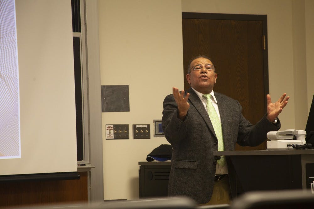 Bassem Eid speaks to an audience Feb. 4 in Woodburn Hall. Eid discussed the Israeli-Palestinian conflict, trying to give a different point of view than previous speakers at IU, who have almost all been Israeli. 
