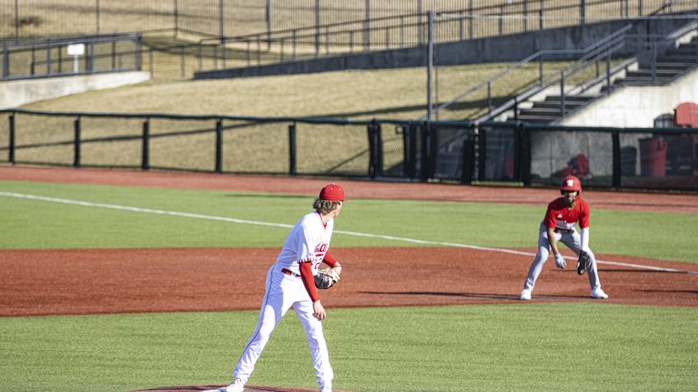 Freshman pitcher Luke Hayden looks back the runner against Miami University (Ohio) on March 1, 2022, at Bart Kaufman Field. Indiana beat Illinois State University on Wednesday night for its second win in two days.