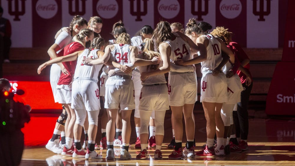 The IU women&#x27;s basketball team huddles before the start of its game against Wisconsin on Jan. 10, 2021, in Simon Skjodt Assembly Hall. Guard Sydney Parrish announced her decision to transfer to Indiana women’s basketball on Saturday morning.