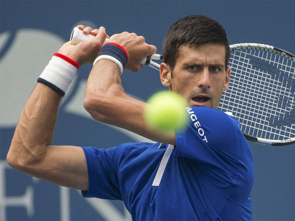Novak Djokovic of Serbia returns a shot to Andreas Seppi of Italy during their third-round match at the U.S. Open Championship at the Billie Jean King Tennis Center in Flushing Meadows in New York on Friday, Sept. 4, 2015. Djokovic advanced, 6-3, 7-5, 7-5.\