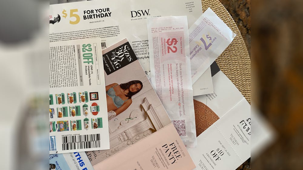 A myriad of coupons is pictured on ﻿Sept. 22, 2023. With a limited budget as a college student, it may feel taxing to indulge in Bloomington’s rich food scene. 