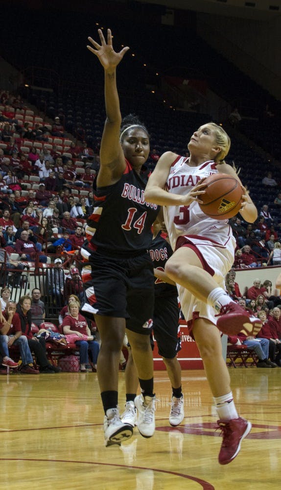 Freshman guard Tyra Buss attempts a layup after stealing the ball during Indiana's season opener against Gardner-Webb Saturday. The Hoosiers won 115-54 breaking a program record, set over two decades ago, for most points scored. Buss led the team in scoring with 18 points, seven steals and four rebounds. The Hoosiers will face Valparaiso at Assembly Hall next Tuesday at 7 p.m.