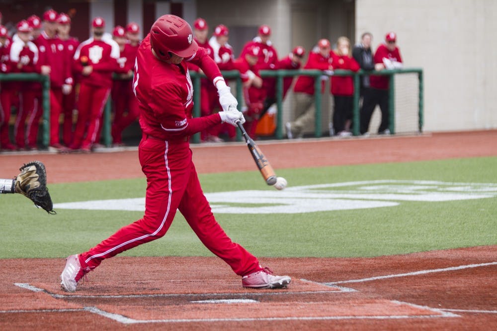 <p>Senior outfielder Logan Sowers hits an RBI single into center field against Northwestern on April 15 at Bart Kaufman Field. Sowers is just one of a number of former IU players playing professional baseball this season.</p>