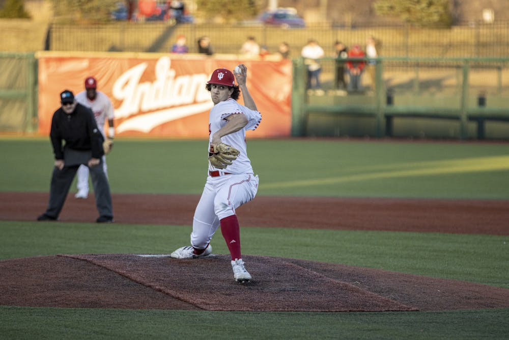 <p>Senior Braydon Tucker winds up to throw a pitch against Miami University on March 1, 2022, at Bart Kaufman Field. Indiana won its series against the University of Evansville 2-1 this weekend.</p>