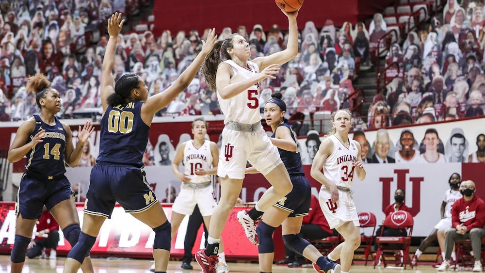 Then-sophomore forward Mackenzie Holmes goes for a shot Feb. 18, 2021, at Simon Skjodt Assembly Hall. Holmes averaged 17.8 points per game last season for Indiana women's basketball.