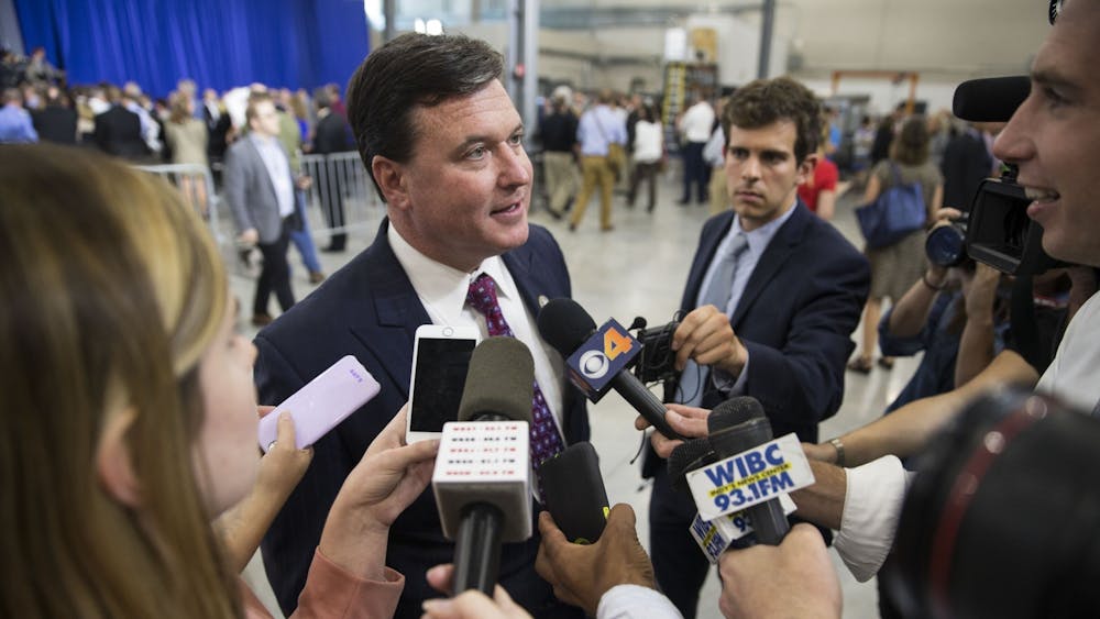 Former representative and Indiana attorney general candidate Todd Rokita speaks with the press after hearing Vice President Mike Pence speak at the Wylam Center of Flagship East on April 19, 2018, in Anderson, Indiana. In an opinion Wednesday, Rokita said IU&#x27;s COVID-19 vaccination reporting requirement violates state law.