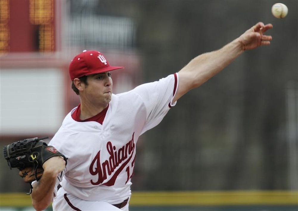 IU freshman pitcher Blake Monar throws to a Minnesota batter during a game Friday afternoon at Sembower Field. IU lost 12-5, dropping Monar's record as a starter to 2-2.
