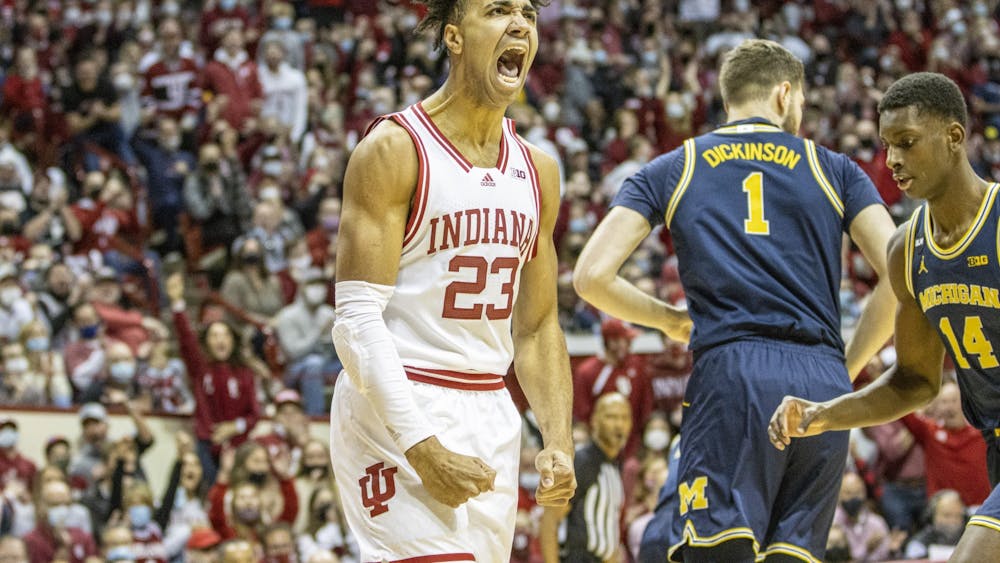 Then-junior forward Trayce Jackson-Davis celebrates after finishing a dunk against Michigan on Jan. 23, 2022, at Simon Skjodt Assembly Hall. Jackson-Davis was named to the Wooden Award Watch List Tuesday.