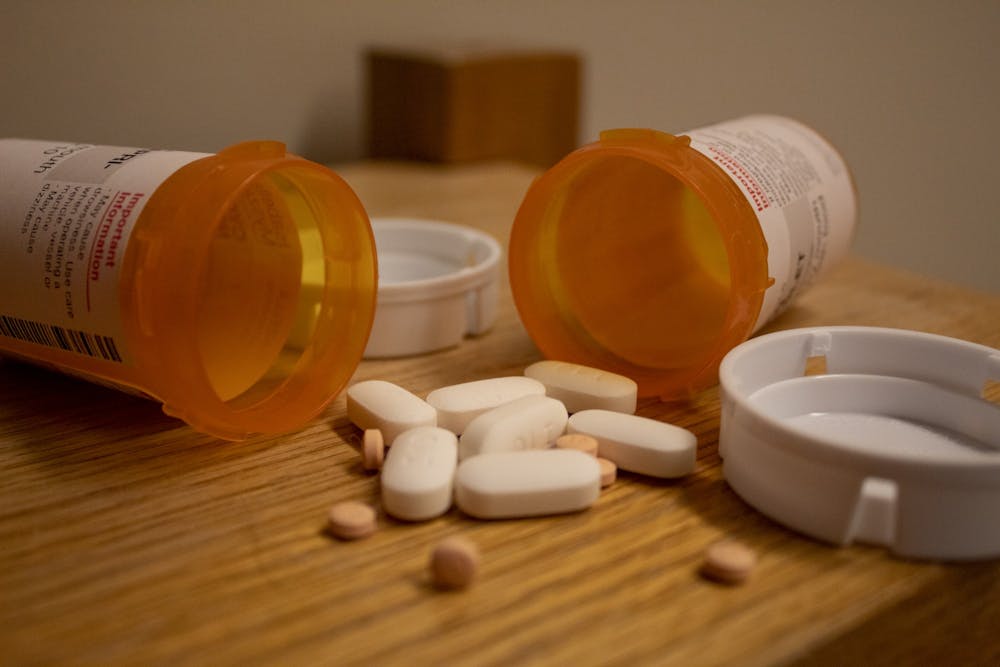 <p>A pile of pills lie on a table Jan. 23 in Willkie Quad. ﻿According to a poll from the Society for Human Resource Management, 57% of employers drug test employees.</p>