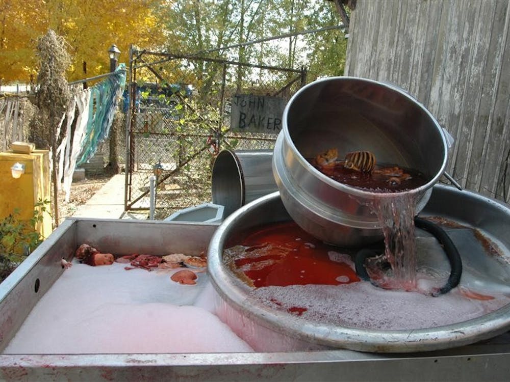 Baker fills metal tubs with "blood" and turns on their water pumps to make it foam.
