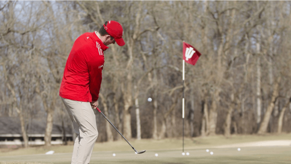 Senior Christain Fairbanks practices chipping onto the green at the IU Golf Course during practice in Jan. 2018. The IU men's golf team finished fifth at last weekend's Big Ten Match Play tournament. &nbsp;