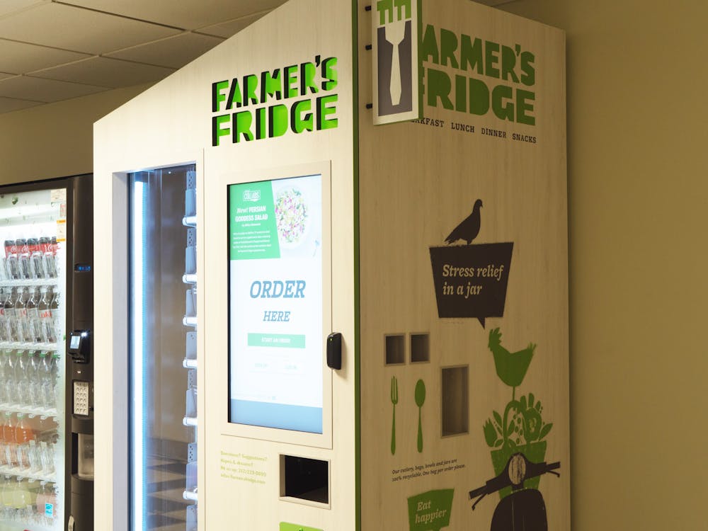 <p>The Farmer&#x27;s Fridge vending machine is seen Nov. 10, 2022, on the first floor of the Simon Music Center. The new machine is the first of its kind in Bloomington, and previously, the nearest was located in Franciscan Health Indianapolis.</p>