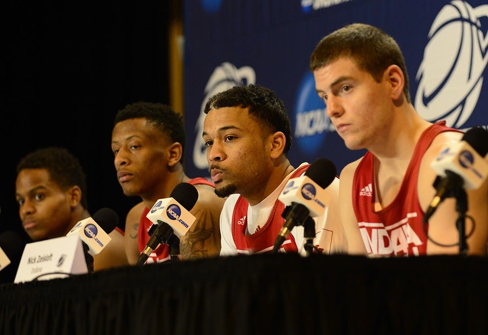 Members of the IU basketball team talk to the media before practice Thursday at the CenturyLink Center in Omaha, Nebraska.