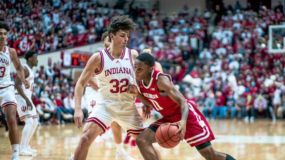 Freshman guard Trey Galloway guards Lorne Bowman II Feb. 15, 2022, at Simon Skjodt Assembly Hall. Indiana lost 74-69 to Wisconsin on Tuesday.