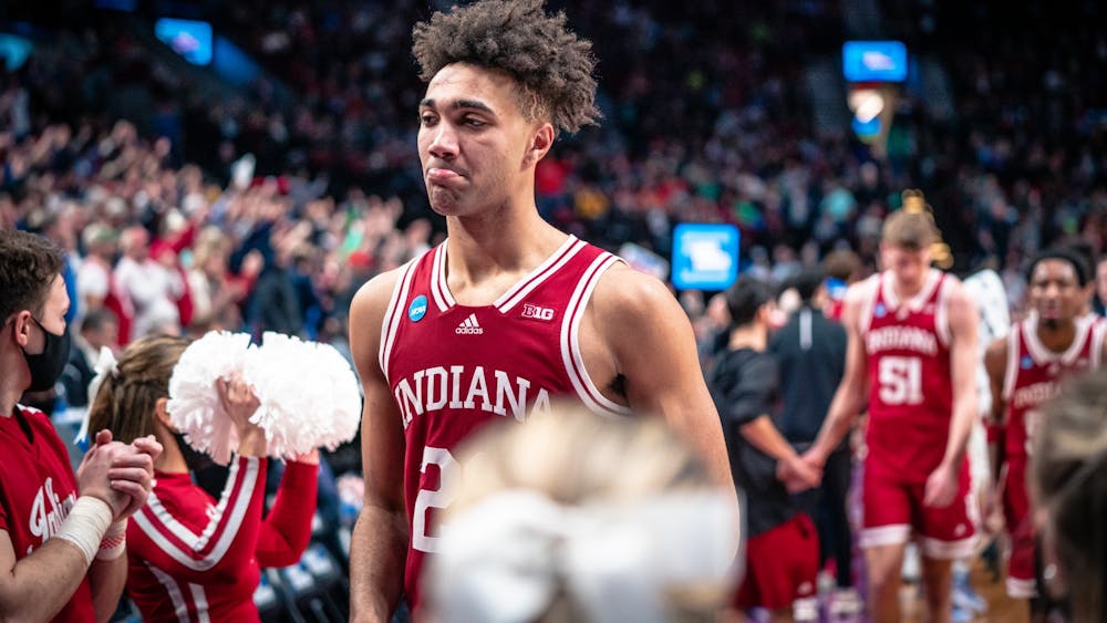Sophomore forward Trayce Jackson-Davis walks off the court following the end of the game Mar. 17, 2022, at the Moda Center in Portland, Oregon. Indiana will partner with Campus Ink and NIL Store to launch a program for student athlete merchandise.