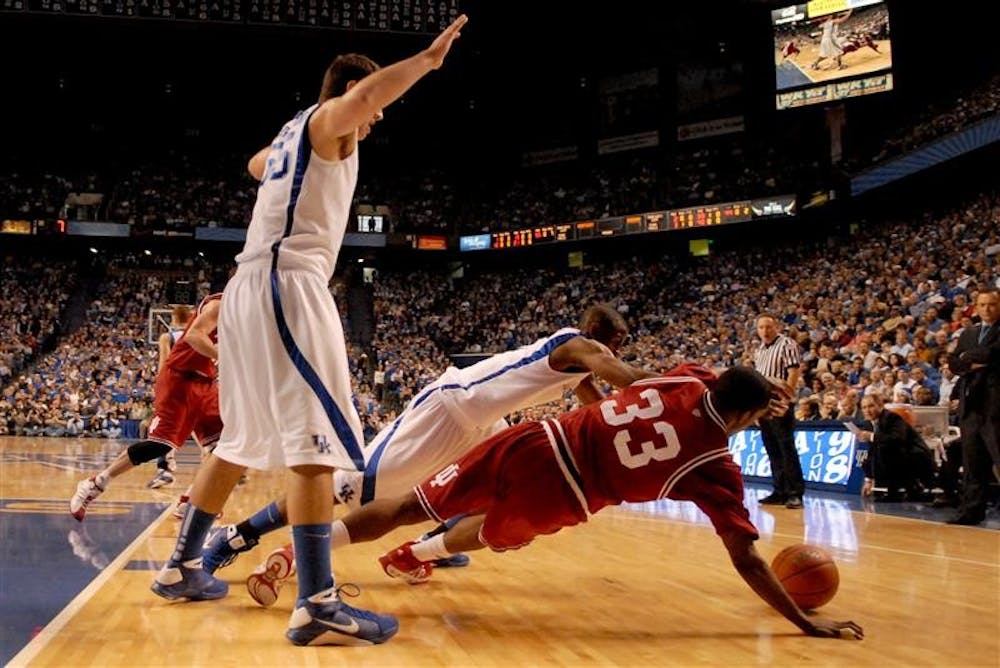 IU guard Devan Dumes dives for a loose ball during IU's 72-54 loss to Kentucky on Saturday in Lexington, Ky.
