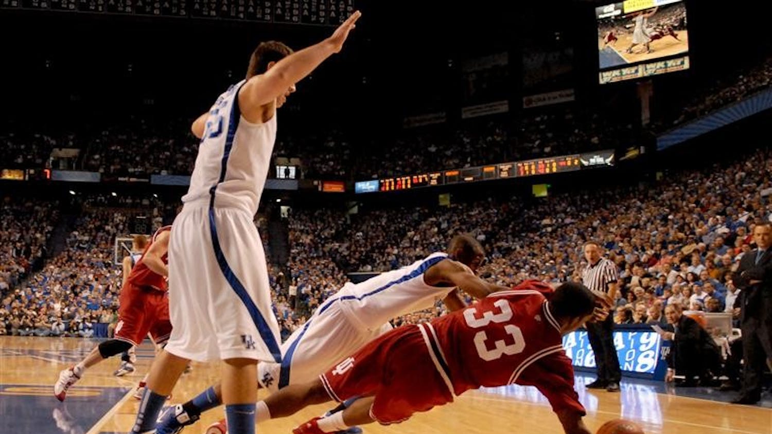 IU guard Devan Dumes dives for a loose ball during IU's 72-54 loss to Kentucky on Saturday in Lexington, Ky.