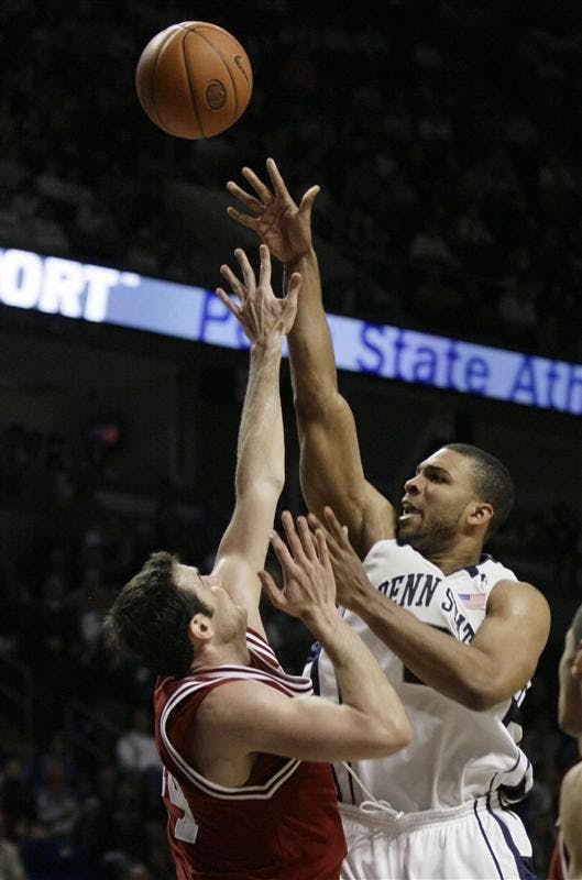 Penn State's Jamelle Cornley, right, shoots over Indiana's  Kyle Taber during the first half of their NCAA college basketball game Saturday in State College, Pa. Penn State won 61-58.