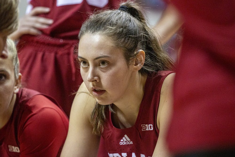 <p>IU junior forward Mackenzie Holmes listens to head coach Teri Moren during an exhibition game against the University of Indianapolis on Nov. 5, 2021, at Simon Skjodt Assembly Hall. Holmes won her third career Big Ten Player of the Week honor Monday.</p>