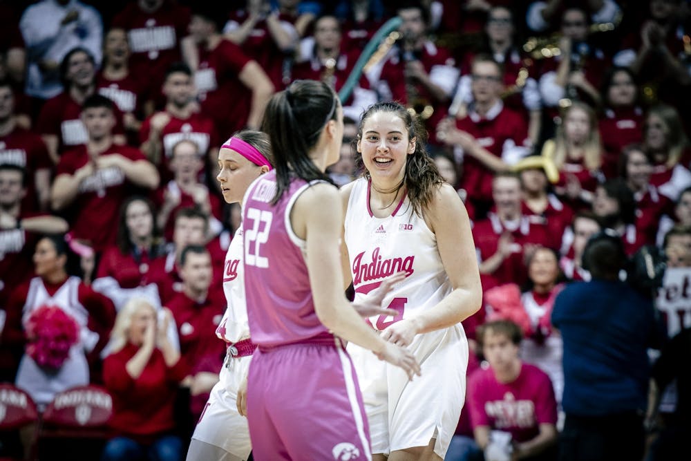 <p>Senior forward MacKenzie Holmes smiles after a turnover Feb. 9, 2023, at Simon Skjodt Assembly Hall in Bloomington. The Hoosiers beat Iowa 87-78.</p>