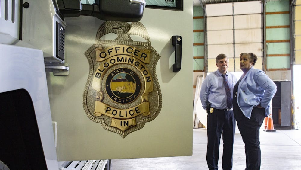 Bloomington Police Department Chief Michael Diekhoff speaks with an attendee at the official unveiling of BPD’s new armored vehicle July 10, 2018, in the Switchyard Park Operations building. This year marks the 15th anniversary of the Jake Laird Law, or Indiana’s red flag law, which allows police departments to temporarily confiscate firearms from people who are deemed dangerous or mentally ill and pose a risk to themselves or others.