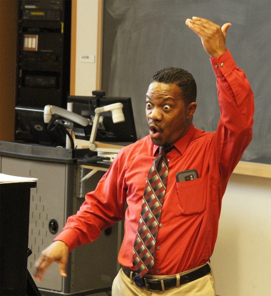 Dr. Raymond Wise, director of African American Choral Ensemble conducts a rehearsal Wednesday at the Neal-Marshall Black Culture Center.