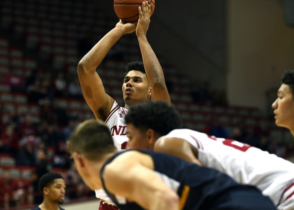 Freshman forward Justin Smith attempts a free throw against Marian on Oct. 28 in Simon Skjodt Assembly Hall. Smith is one of three freshmen who committed to IU while the Hoosiers were coached by Tom Crean, but followed through with enrolling at IU after new Coach Archie Miller was appointed.&nbsp;