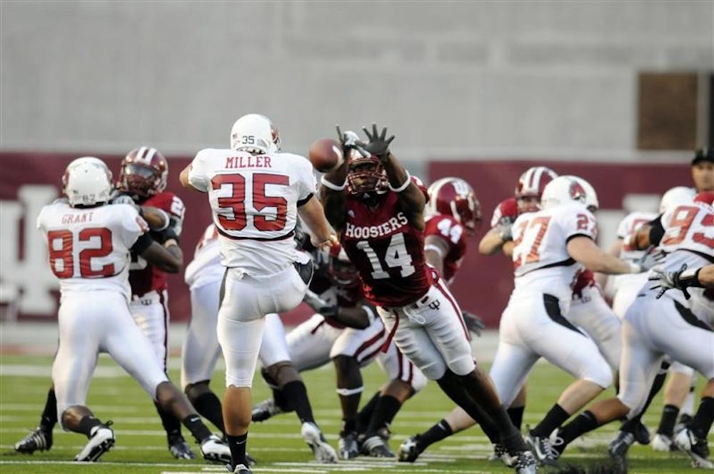 IU sophomore safety Jerimy Finch blocks a punt from Ball State's Chris Miller during the first quarter of a game on Sept. 20 at Memorial Stadium. IU lost the game 42-20.