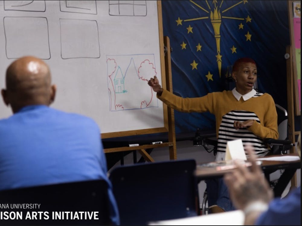 A drawing instructor teaches students during an art class put on by the IU Prison Arts Initiative﻿. The initiative offers a 16-week, semester-long course for individuals in prison using IU instructors.