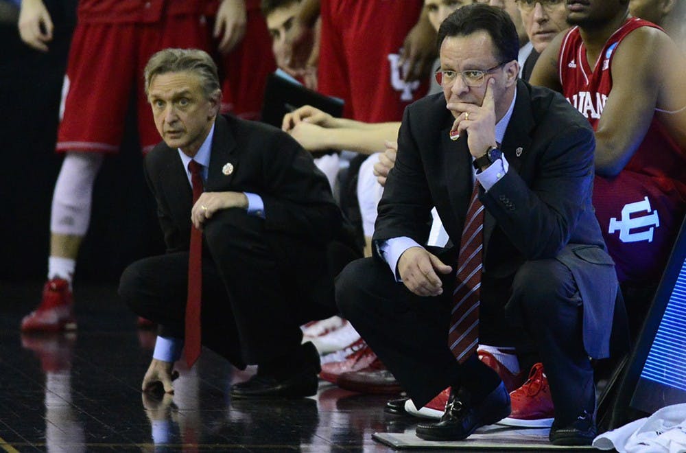 Assistant coach Steve McClain and head coach Tom Crean watch IU's game against Wichita State on Friday at CenturyLink Center in Omaha, Neb. McClain accepted a head coaching position at the University of Illinois-Chicago.