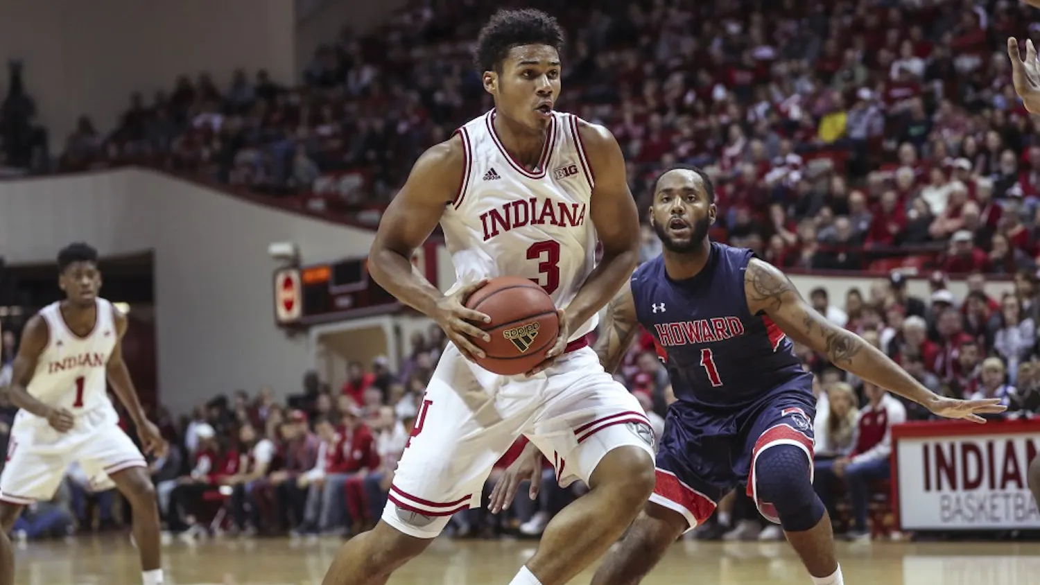 Freshman forward Justin Smith dribbles to the basket during Indiana's game against Howard University on Sunday. The Hoosiers beat Howard 86-77. 