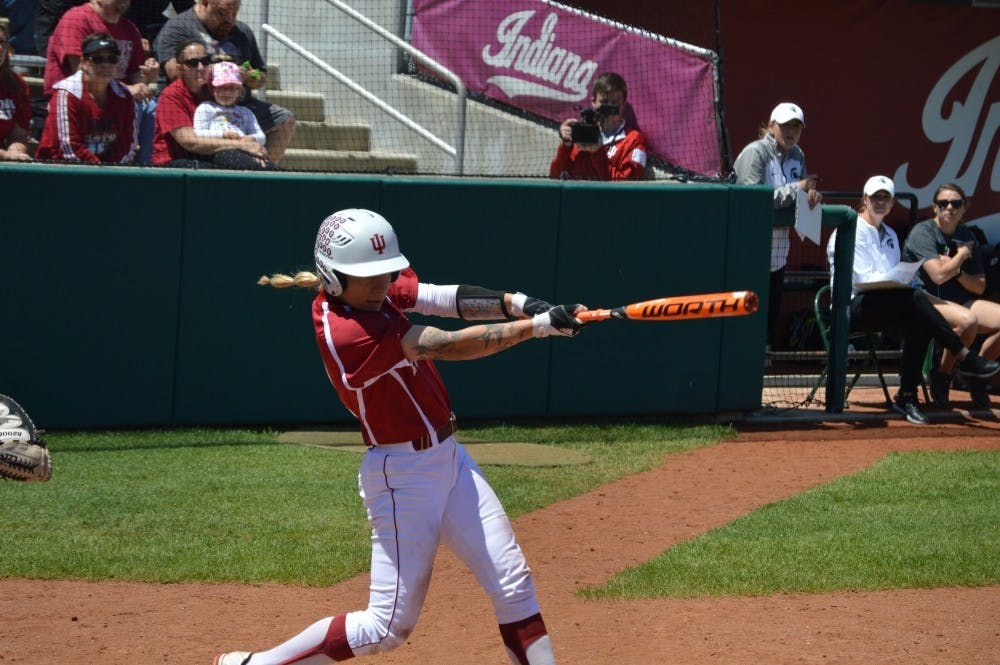 <p>Senior infielder Rachel O'Malley swings and makes contact with the ball during IU's game against Michigan State in May. O'Malley and the Hoosiers are 4-2 in fall season play under new Coach Shonda Stanton.&nbsp;</p>