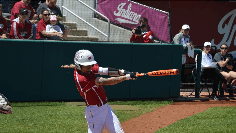 Senior infielder Rachel O'Malley swings and makes contact with the ball during IU's game against Michigan State in May. O'Malley and the Hoosiers are 4-2 in fall season play under new Coach Shonda Stanton.&nbsp;