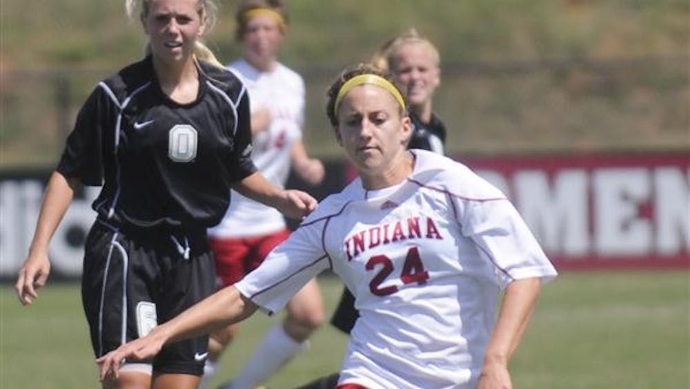 Freshman midfielder Monica Melink prepares to shoot the ball during the second half of the IU vs. Oakland University match Sunday at Bill Armstrong Stadium. The Hoosiers defeated the Grizzlies 1-0. 