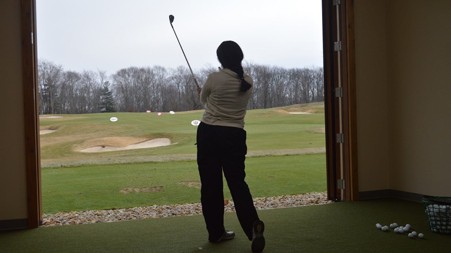 Senior Ana Sanjuan practiced her irons at IU's indoor training facility in early February. Sanjuan finished sixth place individually at the Westbrook Spring Invitational in Arizona over the weekend.