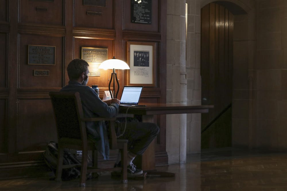 <p>A student studies Dec. 6, 2021, in the south lounge of the Indiana Memorial Union.</p>
